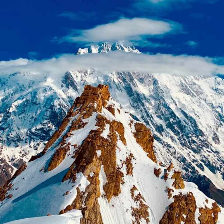 Rupal Peak towering mountain with glacier views