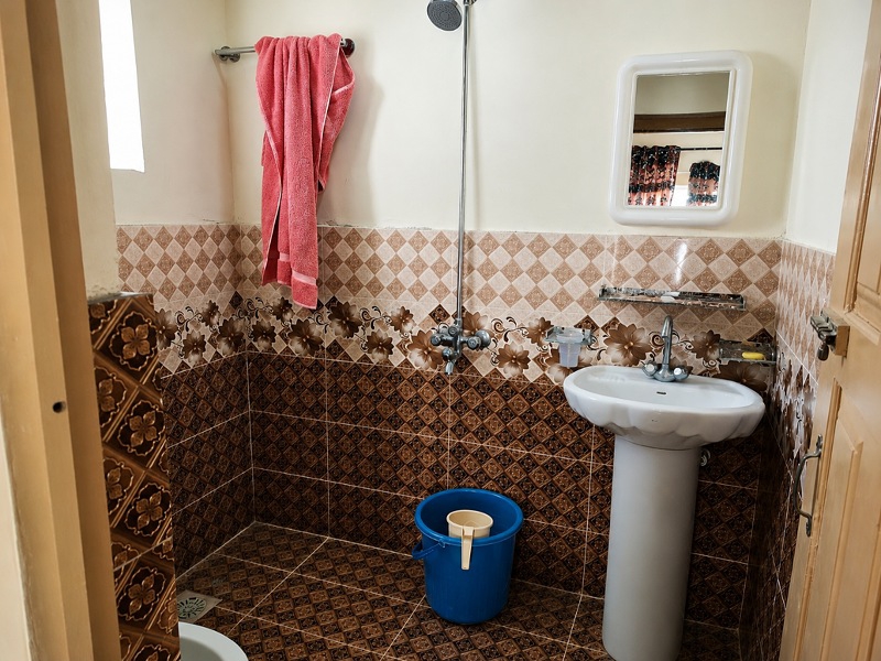 Private washroom of Group Room at Parbat 4 Seasons Resort Rupal