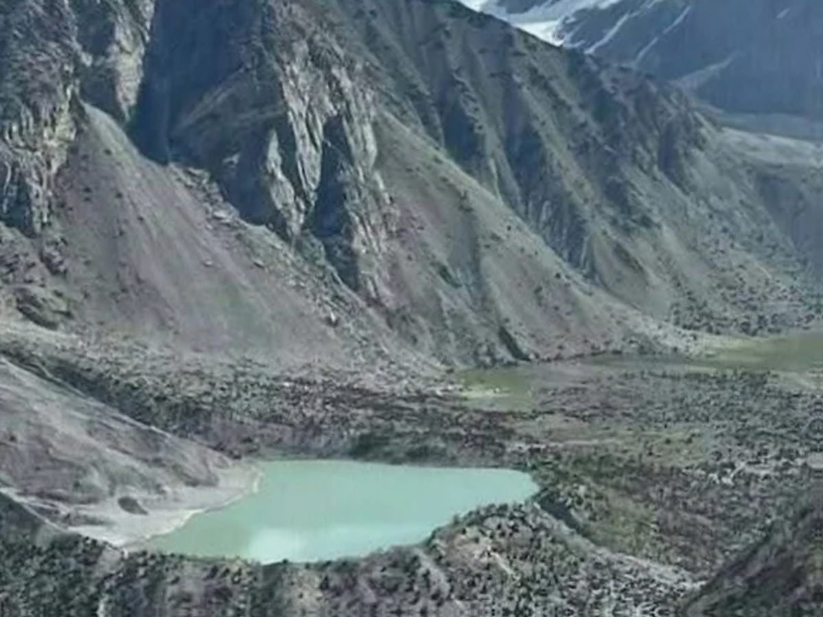 Latbo Lake surrounded by mountains in Rupal Valley